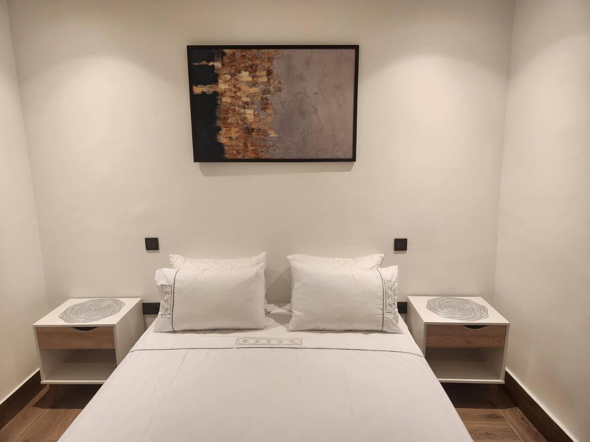 Modern Luxury Retreat: 2-Bedroom Apartment In The Heart Of Marrakech مراكش المظهر الخارجي الصورة